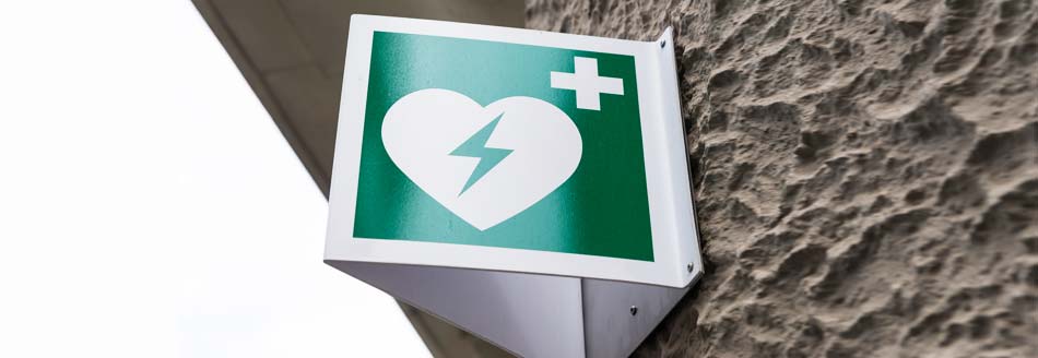 Das Zeichen für einen Defibrillator (AED)