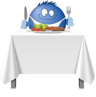 Ein Pointee sitzt am Tisch vor seinem Teller