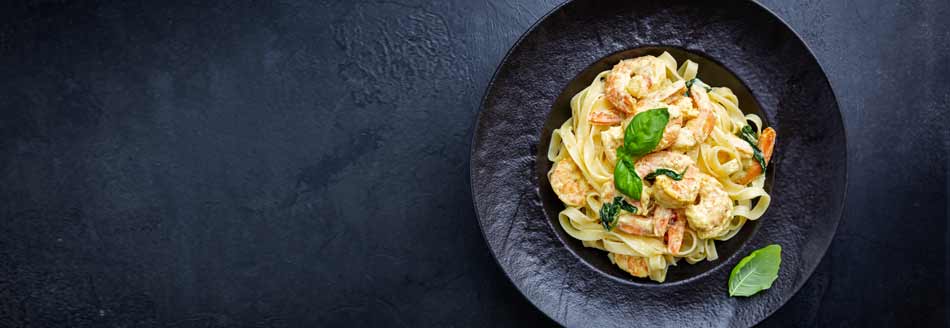 Gekochte Fettuccine mit Scampi